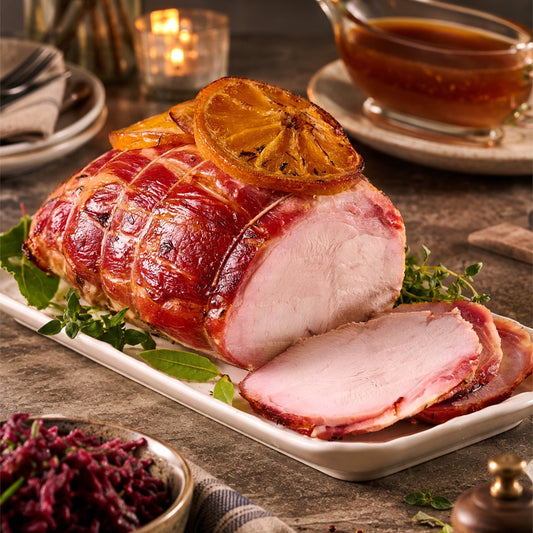 Bacon-Wrapped Free Range Turkey Breast with Orange & Herbs